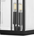 Close-up of 2 Light Outdoor Wall Lantern With Clear Beveled Glass, Traditional Farmhouse Style, Textured Black Finish.