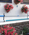 Two Pack Heavy Duty Black Aluminum Pool Pole Hangers With Screws Sturdy Hooks for telescopic poles mounted on a wall