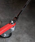 Double End Flexible Head Ratcheting Wrench 13mm And 15mm Set With 180 Degree Pivot in use on red metal tool base