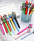60 Piece Funny Pens Set For Adults with Positive Quotes and Quirky Graphics like cute animals displayed in pen holder