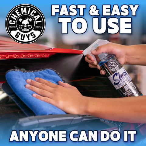 Person using Streak Free Glass And Window Cleaner For Tinted Windows Ammonia Free Safe On Factory And Aftermarket Tint 16 Oz