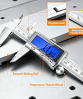 6 Inch Rechargeable Digital Caliper with Backlit LCD USB C Charging Stainless Steel Measuring Tool 0 to 150 mm Inch Millimeter Switch on metal surface