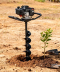 Heavy Duty 800mm By 150mm Steel Garden Earth Auger Drill Bit With Locking Pin in soil near small plant