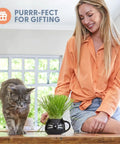 Woman with cat and Organic Cat Grass Growing Kit For Indoor Cats With Premium Seed Mix, Soil, And Planter, Hairball Control.
