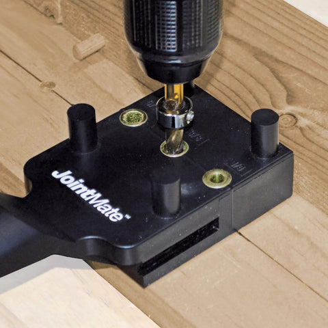Close-up of Handheld Dowel Jig For Flawless Corner Edge Surface Woodworking Joints With Adjustable Fence in use.