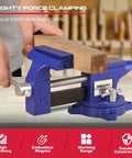 Person using Heavy Duty Four And A Half Inch Tough As Nails Bench Vise With Multi Jaw Design For Woodworking And Metalworking Clamps Flat Or Round Materials On A Workbench Or Table Clamp For Welding Drilling Milling And More on a wooden block.