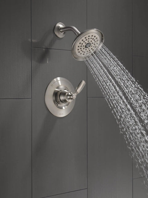 Woodhurst 14 Series Brushed Nickel Shower Trim Kit With Matching Shower Head And Handle Universal Rough-In Compatible Valve Not Included Great For A Slick Bath Remodel Look showing water flow