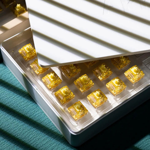 Creamy Yellow V5 Linear Keyboard Switches with LED Diffuser in a plastic tray, showcasing 5Pin, 50gf lubed design for gaming keyboards.