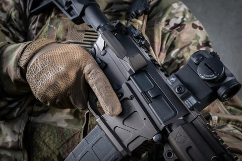 0.5mm High-Dexterity Tactical Work Gloves with Secure Fit worn by man holding rifle, Men's Size Small, Brown