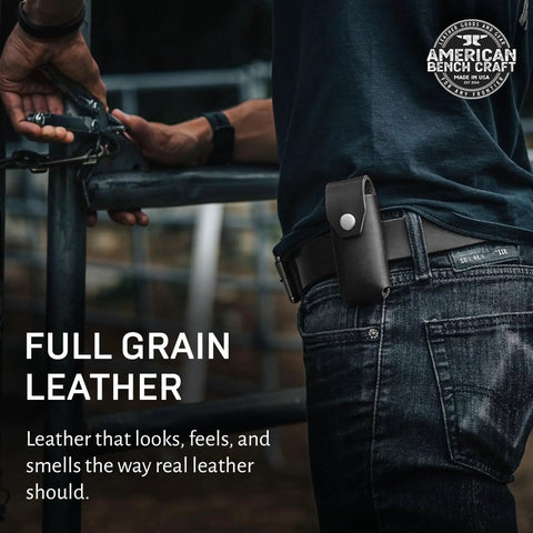 Beefy Full Grain Leather Belt Tool Holder for Surge Super Tool 300 Core Multitools on person's belt outdoors
