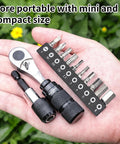 Hand holding All In One Bike Repair Kit With Mini Ratchet Wrench And Ten Bits One Quarter Inch Ratcheting Driver Extension Rod