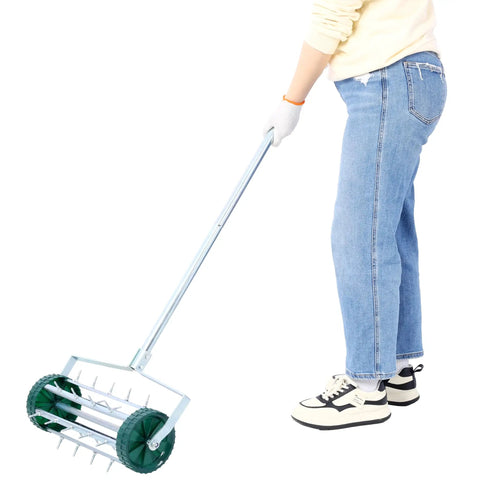 Person using Rolling Lawn Aerator With 39 Iron Spikes And 58 Inch Handle, Heavy Duty Manual Aerator Tool for lawn care