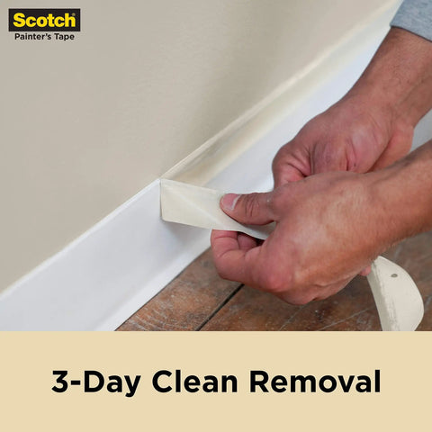 Person removing Contractor Grade Masking Tape That Sticks Like A Pro 0.94 Inch By 60.1 Yards Per Roll 9 Rolls High Adhesion Painter Tape