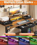 Super Slick Electric Lift Desk With Height Adjustable Standing Gaming Station And Super Cool 10 Color LED Lighting Modes For Ultimate Vibe, featuring multiple color modes and gaming setup.