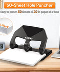 Heavy Duty Three Hole Punch 50 Sheet Capacity With 50 Percent Less Effort Labor Saving Lever on desk