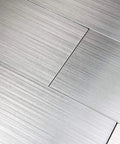 Close-up of Stainless Steel Peel And Stick Kitchen Backsplash Tiles 4x12 Inch Self Adhesive Metal Tiles 30 Pack Dry Install No Mess Easy DIY Makeover Covers 10 Sq Ft