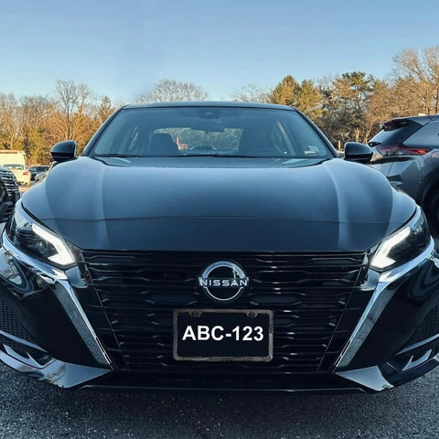 Carbon Fiber Look License Plate Frame Made From Durable Aluminum Scratch Resistant Metal Plate Holder For Cars Universal Fit For US And Canada Plates Rust Proof And Waterproof Dope For Men And Women Everywhere on parked car with license 'ABC-123'