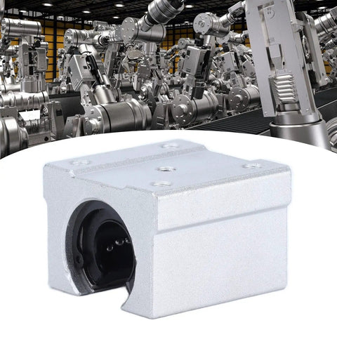 SBR16UU 16MM Aluminum Linear Slide Block With Straight Up Smooth Glide Ball Bearing Bushing For Cnc Routers And 3D Printers Plus Heavy Duty Pillow Mount Design And Low Friction Motion displayed with industrial robotic arms in background.