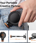 All Metal MagSafe Tripod Mount With 360 Degree Adjustable Phone Holder shown in a hand, compact size for portability.