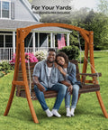 Couple sitting on oversized wooden porch swing bench with cup holders and phone slots, heavy duty 880 pounds, 5 foot