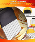 Front view of large stainless steel crinkle cutter with black ergonomic handle and wavy blade for potatoes