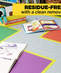 Colored Masking Tape Pack, 3 Rolls (0.94 in x 20 yd / 24 mm x 18.3 m), Red Yellow Green in a classroom setting with books on taped floor.