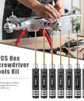 Heavy Duty Pro Grade Titanium Coated Hex Screwdriver Kit With Seven Precision Steel Bits For Fpv Racing Drones Rc Helicopters And Watercraft Hassle Free Tuning Gear, shown with a drone and tools.