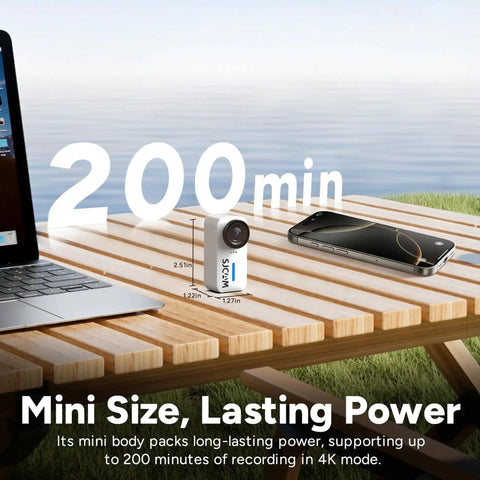 C110 Plus Action Camera 4K Video With Gyro Stabilization And Audio Recording For Vloggers shown next to laptop and phone on a table.