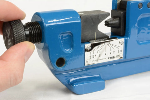 Close-up of Rugged Dieless Lug Crimp Tool for 8 AWG to 4/0 cables, showing adjustable black oxide ram and blue finish