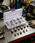 Top Notch 45 Piece Zerk Grease Fittings Kit Made From Durable Carbon Steel Featuring M6 M8 And M10 Straight And Angled Nipples For Tractors And Heavy Equipment Maintenance Tasks Easy Access To Tough Spots, open case on workbench