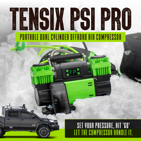 TenSix PSI Pro Technology 12 Volt Air Compressor Heavy Duty in snow with dual cylinders, 4ft stainless hose, and pressure display.