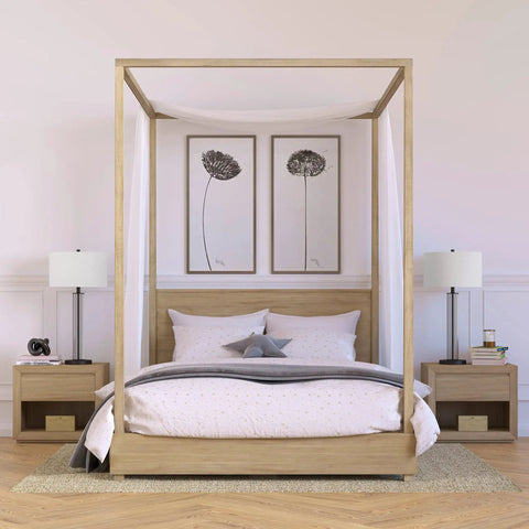 29 Inch Tall Table Lamp With Clear Glass Base Blackened Bronze Finish And White Fabric Shade Next-Level End Table Nightstand Desk Lamp Soft Diffused Light And Warm Glow For Living Rooms beside a canopy bed in a modern bedroom.