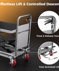 CAMMOO hydraulic lift table cart, gray with black non-slip pad; front view showing foot-activated lift and caster wheels.