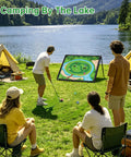 Group playing with Dual Sided Golf Chipping Game Set With Club Sticky Golf Games Pro Battle Mat near a lake while camping.