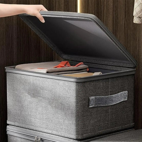 Slick Fabric Storage Bin With Combination Lock Waterproof Foldable Wardrobe Organizer Keeps Your Essentials Safe Collapsible Drawer Tote open with clothes inside.