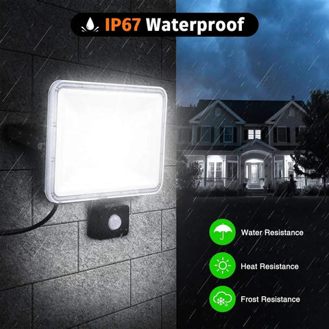 100W Led Floodlights with Motion Sensor, 6000K-6500K Daylight White 80 mounted on a wall in rain, showcasing IP67 waterproof features.