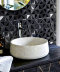 Stainless Steel Backsplash Tiles Peel And Stick 10 Sheets with 3D Brushed Windmill Pattern in black behind white sink.
