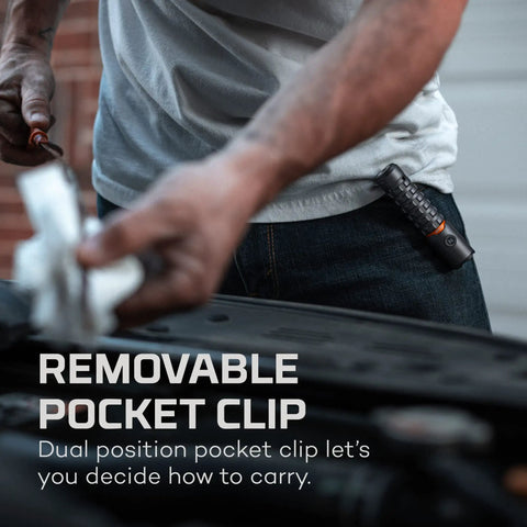 Torchy 2K Rechargeable Pocket Flashlight with 2000 Lumens clipped to jeans during car repair.