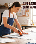Powerful Electric Scissors Cordless For Fabric And Craft With Two Blades cutting fabric on a wooden table, ideal for sewing projects.