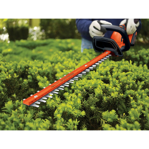 40V Max Cordless Hedge Trimmer With 24-Inch Dual-Action Blades Battery And Charger Included Low Vibration For Fast Clean Hedge Trimming And Easy Yard Maintenance being used in garden