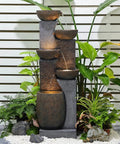 51.4 Inch Outdoor Water Fountain With Five Tier Showstopper Cascading Water Feature for Garden, with LED lights, plants in background