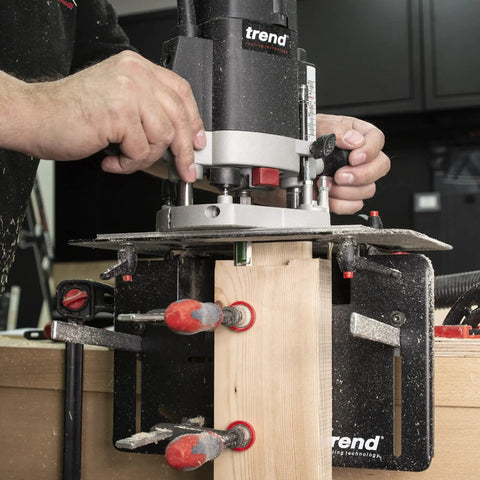 Dead On Mortise And Tenon Jig For Plunge Routers Slick Adjustable Woodworking Jig in use cutting wood with clamps.