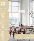 Eloise 16 Inch 3 Light Modern Pendant Light Chandelier in a dining room setting, antique white finish, compatible with bulbs.