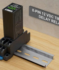Liquid Crystal Display Time Relay With Dual Time Delay Function Double Pole Double Throw 12 Volt Direct Current Plug In Socket Rugged ABS Housing Silver Alloy Contacts