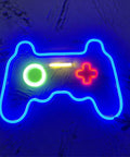 Christmas Gamepad Neon Sign For Gamers 16 By 11 Inches USB Powered LED Light in blue, green, and red colors on a wall