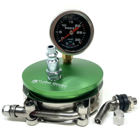 Front view of a medium aluminum boost leak tester with a 3-inch end cap on a green anodized base and pressure gauge.
