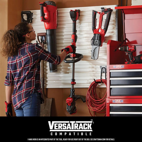 Person organizing tools on wall with VersaTrack system, including Cordless Electric Pruner With 2 Ah Battery And Charger Included For Heavy Duty