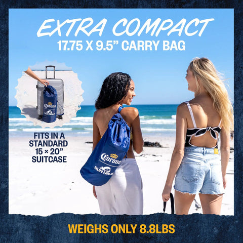 Two women on beach carrying Limited Edition Corona Beach Tent Sun Shelter With Easy Pop Up Setup UPF50 Plus Sun Coverage bag