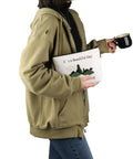 Person holding Geocaching Makeup Bag For Outdoor Lovers It Is A Beautiful Day For Geocaching Gift Beige Durable Canvas Zip Bag