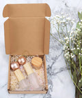 Rock Solid 50 Pack Small Shipping Boxes 6x6x2 Inch Brown Kraft Corrugated Cardboard Mailing Cartons For Ecommerce Business Packaging And Gift Wrapping Straight Up Sturdy Easy Peasy Setup Anytime with decorative items inside.